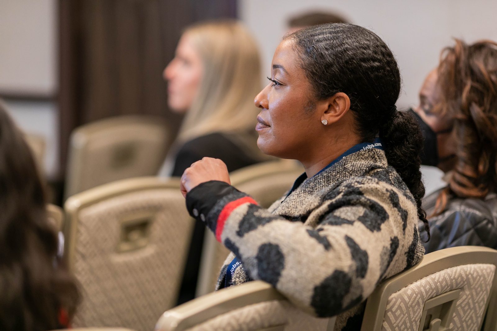 Attendees listening during a MIC session